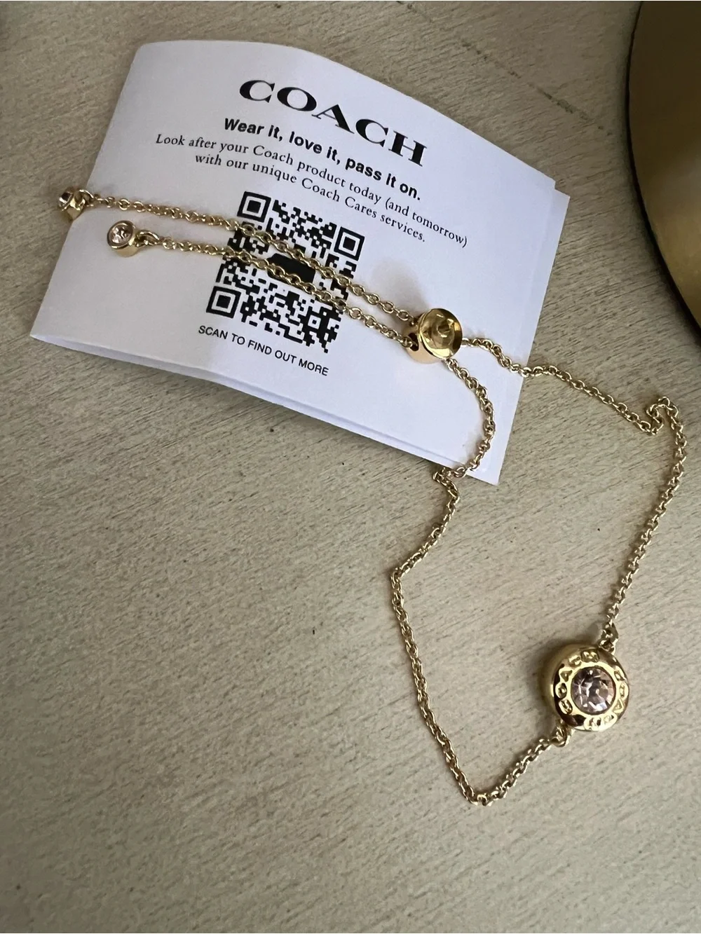 COACH Gold Tone Pendant Slider Necklace with Crystal